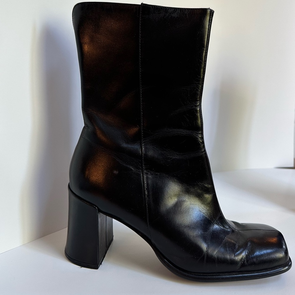 Steve Madden side-zip black leather boots. Worn